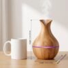 essential-oil-diffuser-size-dimensions-15cm Essential oil diffuser size comparison, 15cm tall next to a coffee mug
