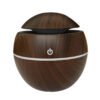 Dark wood-grain home fragrance diffuser on white background
