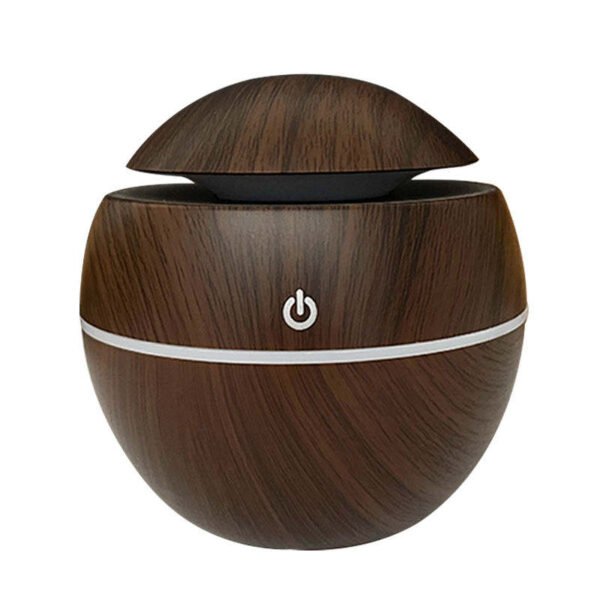 Dark wood-grain home fragrance diffuser on white background
